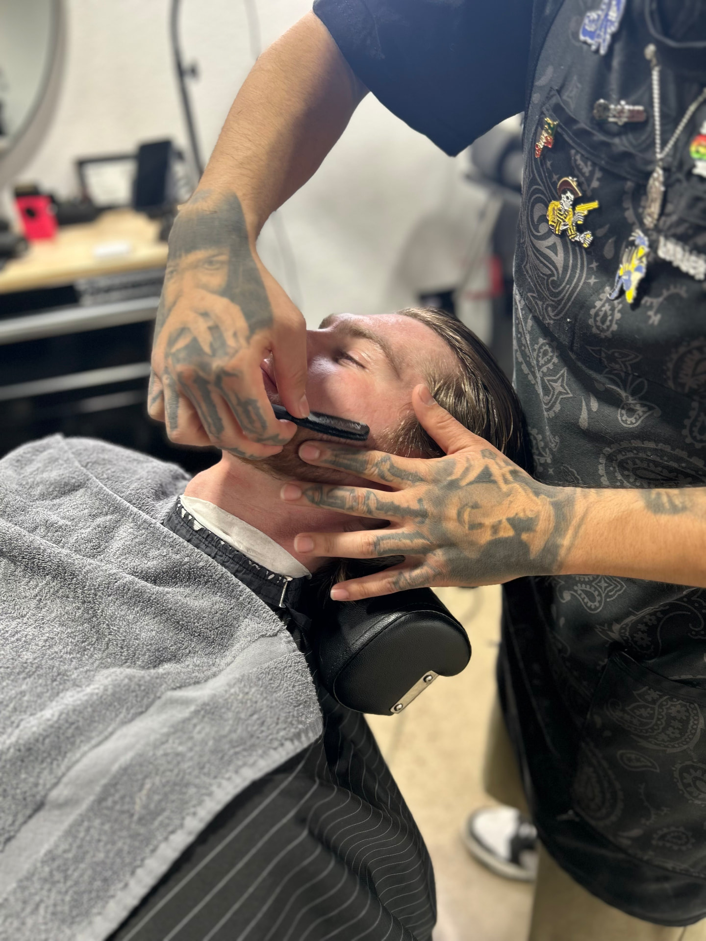 Straight razor shave with a hot towel at To the Nines Barbershop in Tempe